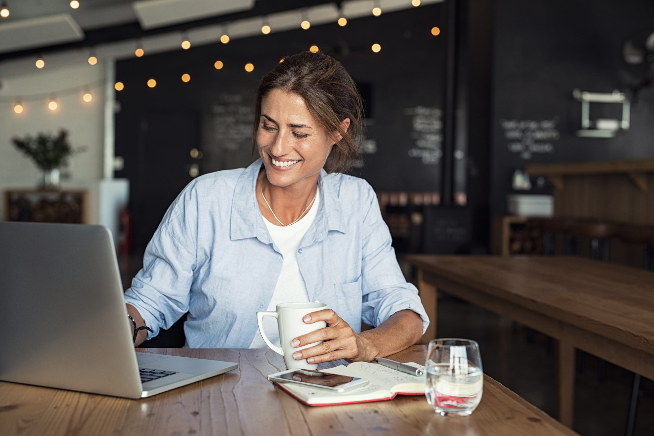 Mature woman working on laptop Freedom to work anywhere